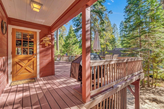 41816 N Dogwood Rd, Shaver Lake, CA 93664 - wooden terrace with view of scattered trees and grilling area