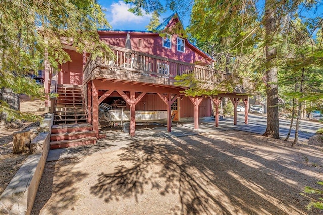 view of front of property featuring a deck