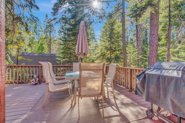 41816 N Dogwood Rd, Shaver Lake, CA 93664 - deck with outdoor dining area and a grill
