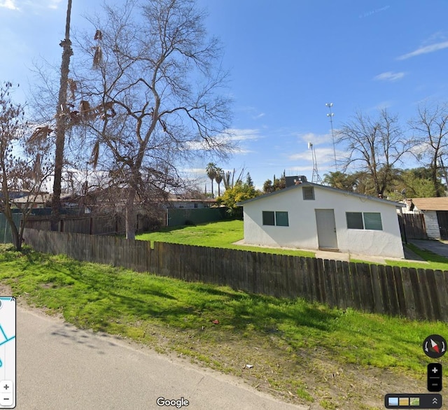 view of home's exterior featuring a yard