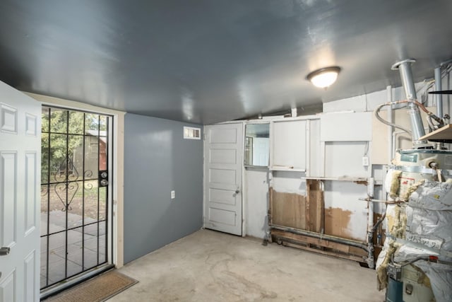 basement featuring water heater