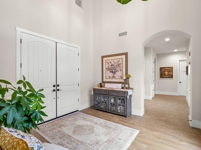 foyer featuring a high ceiling