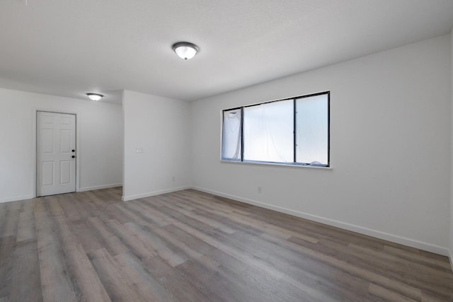 empty room featuring light hardwood / wood-style floors