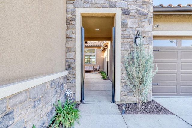 entrance to property with a garage