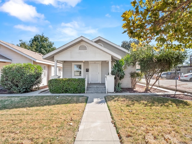 view of front of home with a front lawn