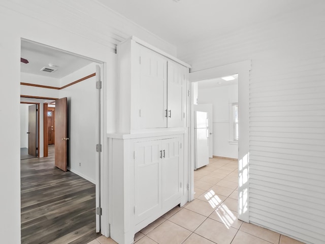 hall featuring light hardwood / wood-style flooring