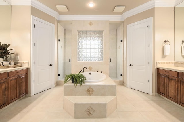 bathroom with vanity, crown molding, independent shower and bath, and tile patterned flooring