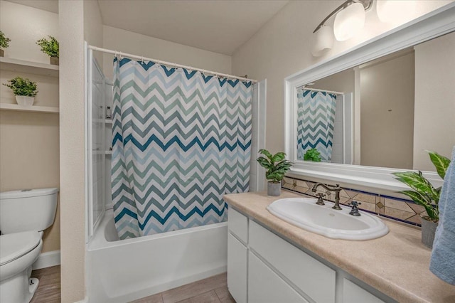 full bathroom featuring vanity, shower / tub combo, and toilet