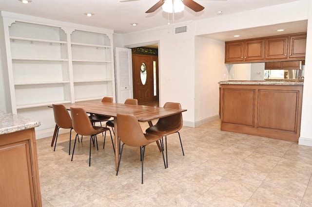 dining room with baseboards, visible vents, ceiling fan, and recessed lighting