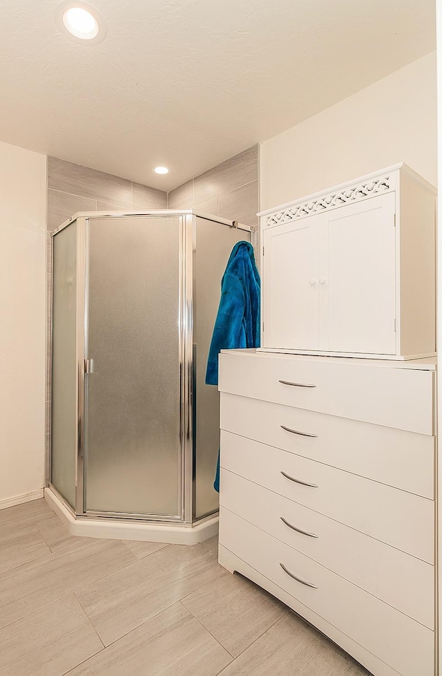 bathroom featuring walk in shower