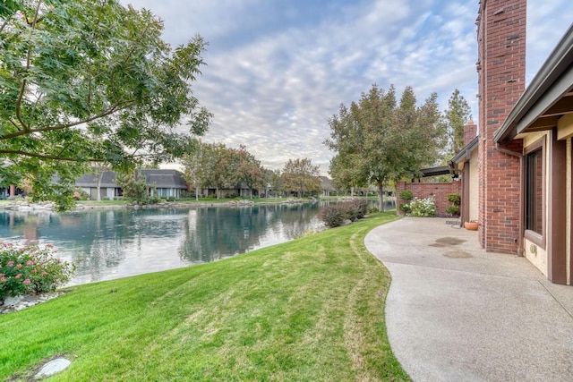 view of yard with a water view