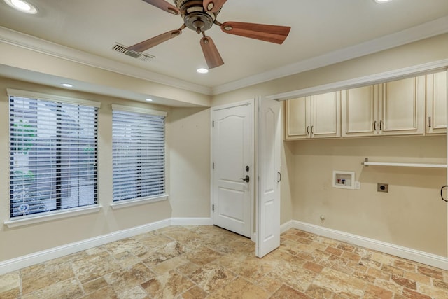 laundry room with hookup for an electric dryer, crown molding, hookup for a washing machine, and cabinets