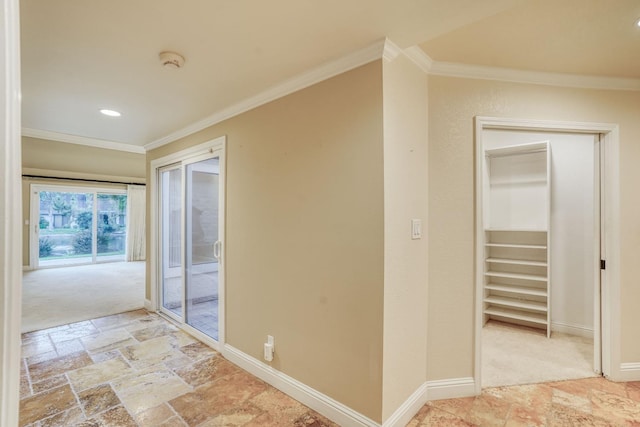 hall with light carpet and crown molding