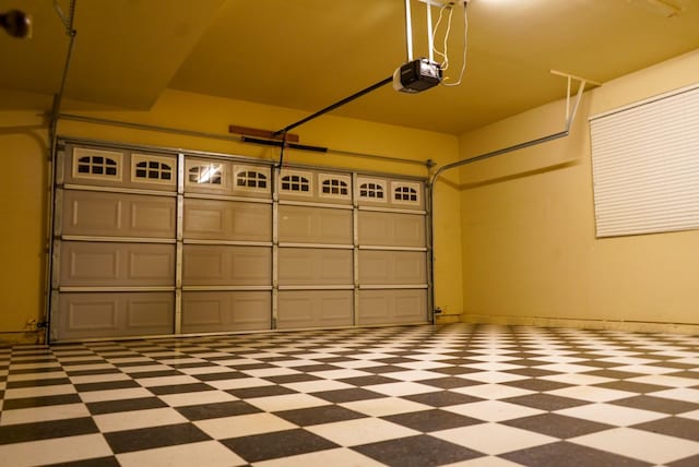 garage featuring a garage door opener