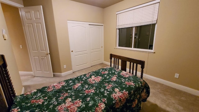 bedroom featuring a closet and carpet