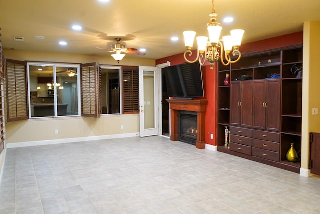 unfurnished living room with ceiling fan