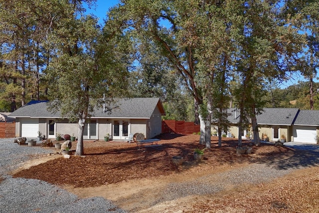 ranch-style home with a garage