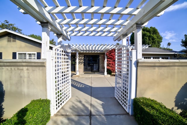 view of patio featuring a pergola