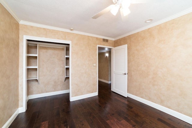 unfurnished bedroom featuring ornamental molding, dark hardwood / wood-style floors, and ceiling fan