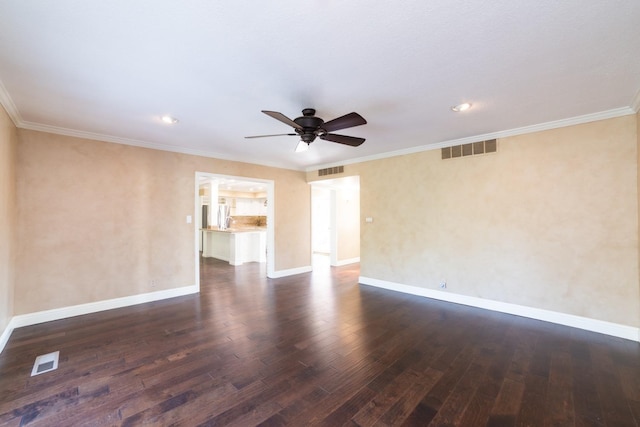 unfurnished room with crown molding, ceiling fan, and dark hardwood / wood-style flooring