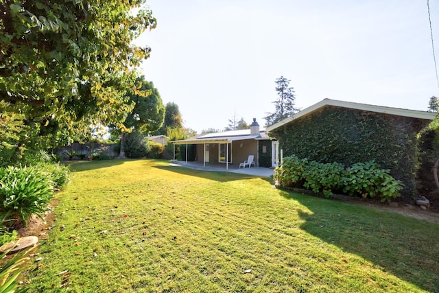 view of yard with a patio