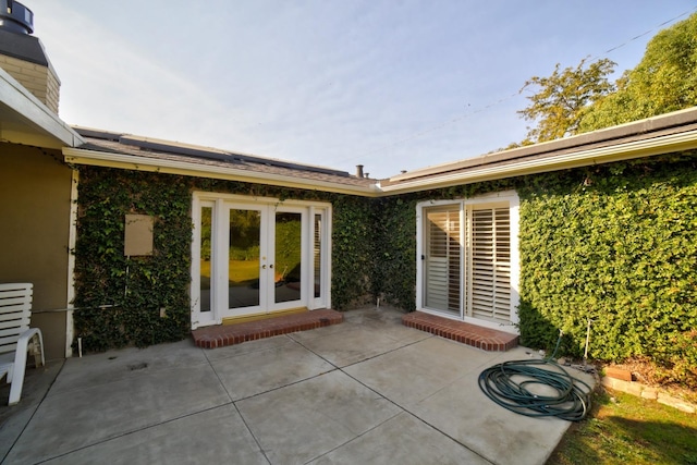 view of patio / terrace featuring french doors