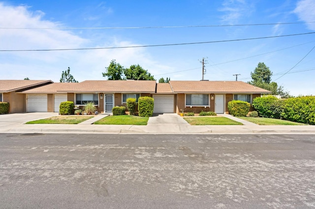 ranch-style home with a garage