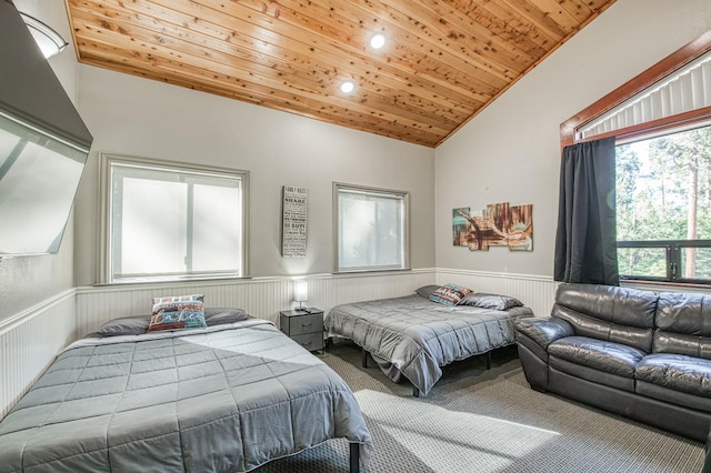 bedroom featuring wooden ceiling and high vaulted ceiling