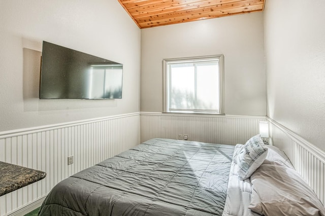 bedroom featuring wooden ceiling and vaulted ceiling