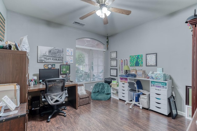 office area with ceiling fan and dark hardwood / wood-style floors