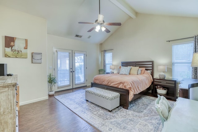 bedroom with beamed ceiling, ceiling fan, hardwood / wood-style floors, french doors, and access to outside