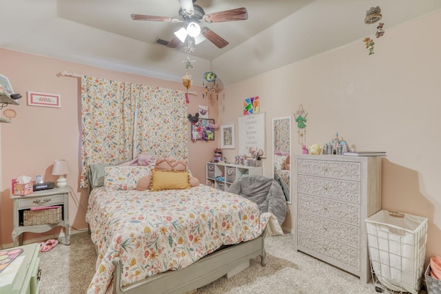 bedroom featuring ceiling fan and carpet