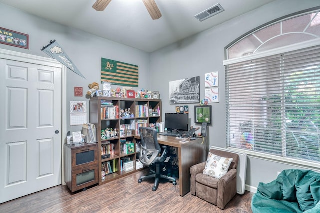 office space with hardwood / wood-style flooring and ceiling fan