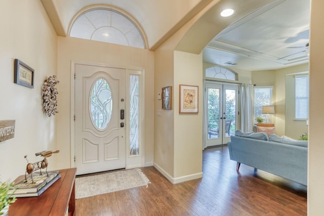 entrance foyer with french doors, hardwood / wood-style floors, and ceiling fan