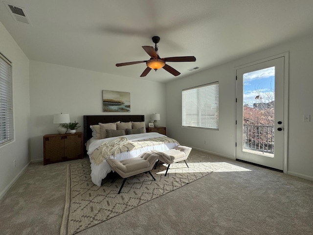 carpeted bedroom featuring access to outside and ceiling fan