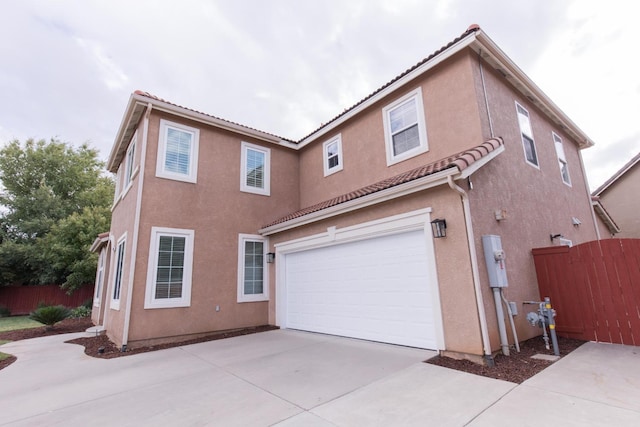 exterior space with a garage