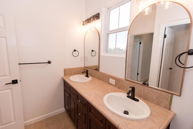 bathroom with vanity and tile patterned floors