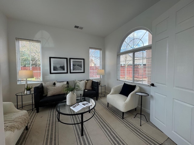 living area with light carpet