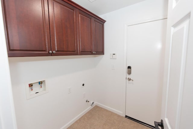 laundry area with cabinets, gas dryer hookup, hookup for a washing machine, and hookup for an electric dryer