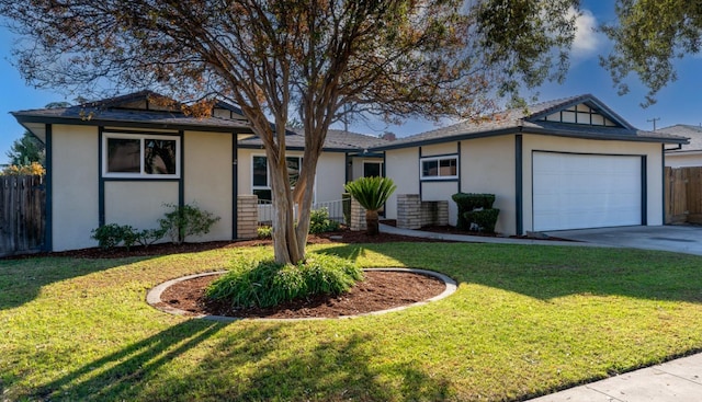 ranch-style house with a garage and a front lawn