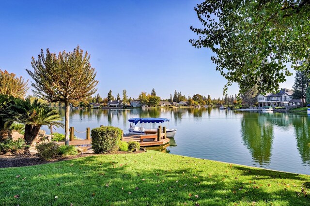 property view of water with a boat dock