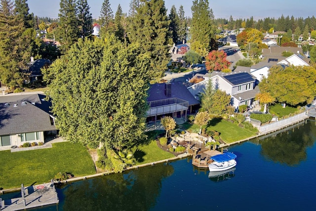 birds eye view of property featuring a residential view and a water view