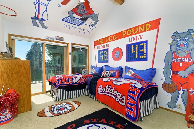 bedroom featuring lofted ceiling, access to exterior, and carpet floors