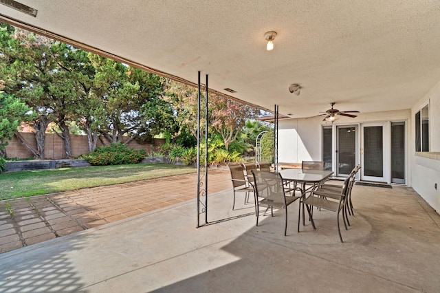 view of patio / terrace featuring ceiling fan