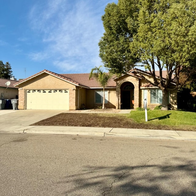 ranch-style home with a garage