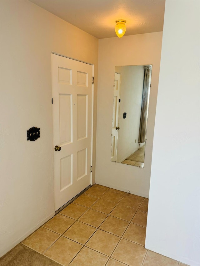 interior space featuring light tile patterned floors