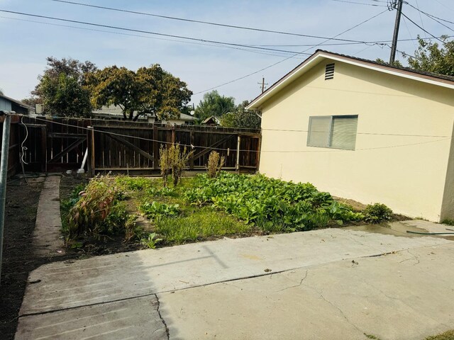 view of home's exterior with a patio area