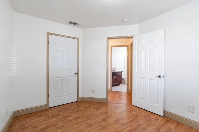 unfurnished bedroom featuring light hardwood / wood-style flooring