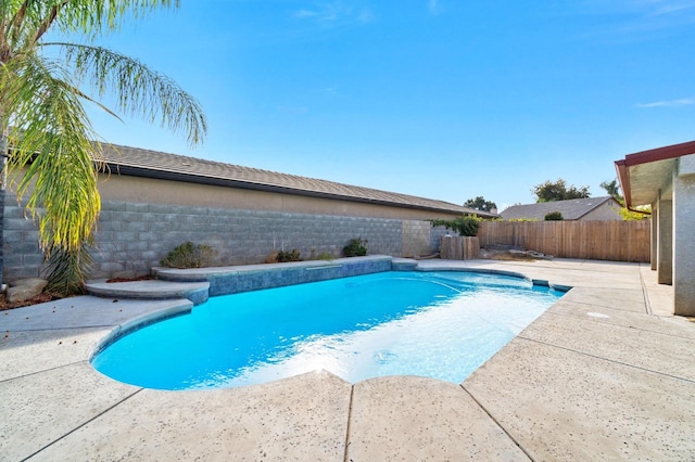 view of pool featuring a patio area