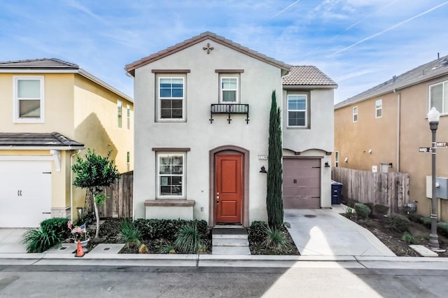 mediterranean / spanish-style house featuring a garage